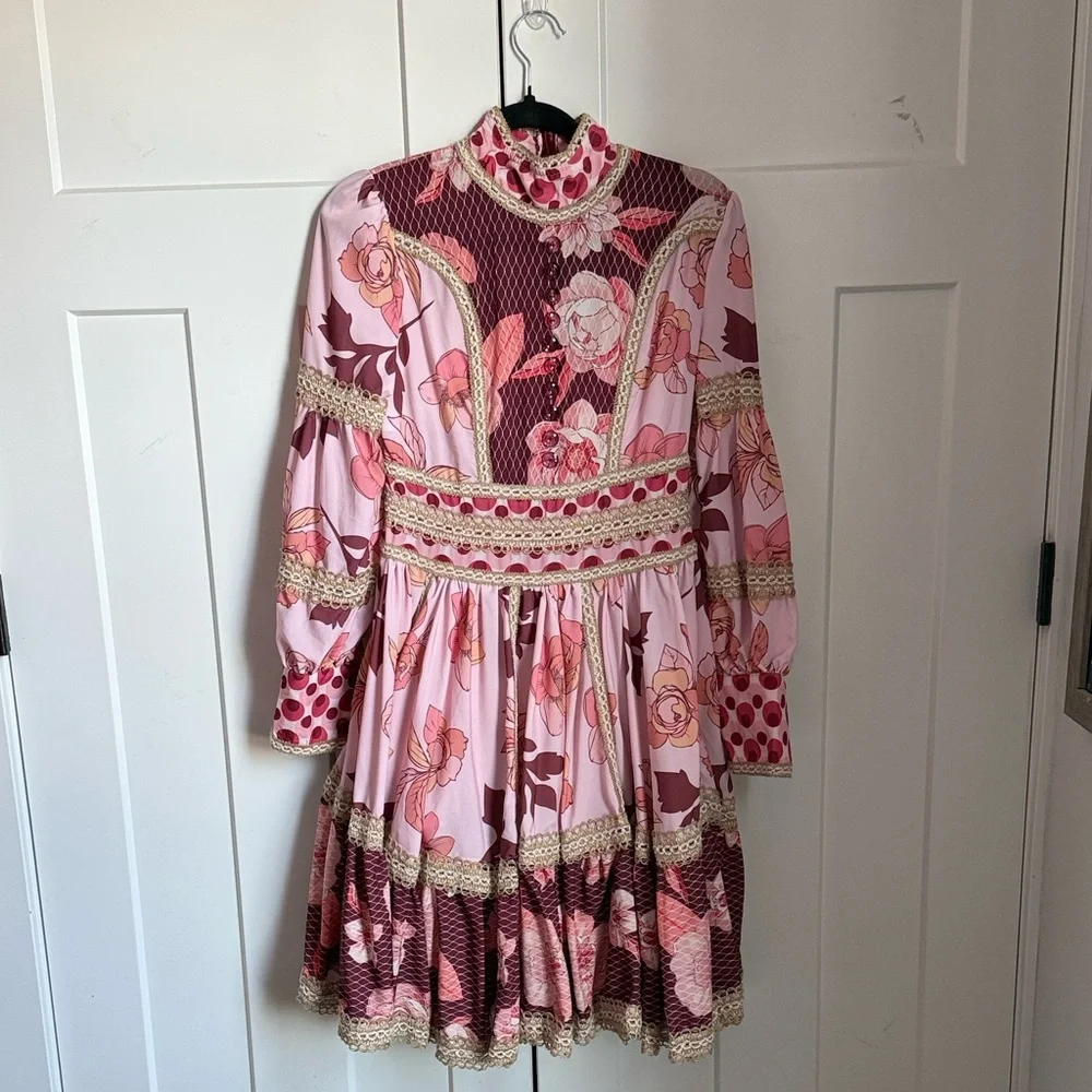 It’s giving Zimmerman without the price tag! Pink and burgundy floral dress sm.